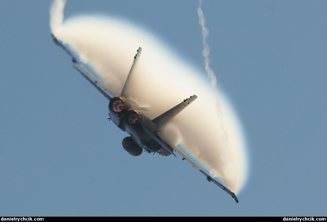 F-18 Hornet with a big condensation cloud