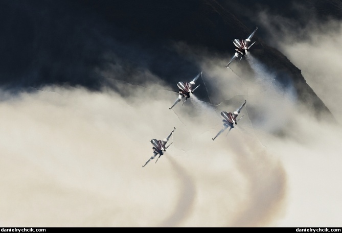 Patrouille Suisse formation above the low clouds