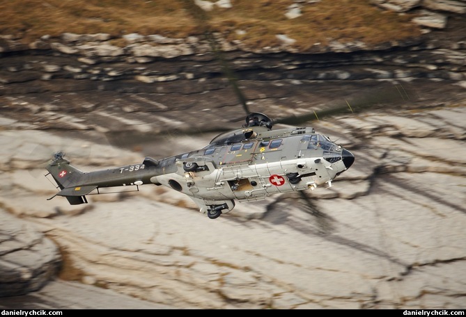 Super Puma above Axalp rocks