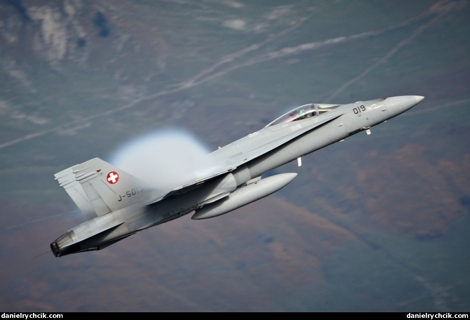 F/A-18C Hornet pulling up with a condensation cloud