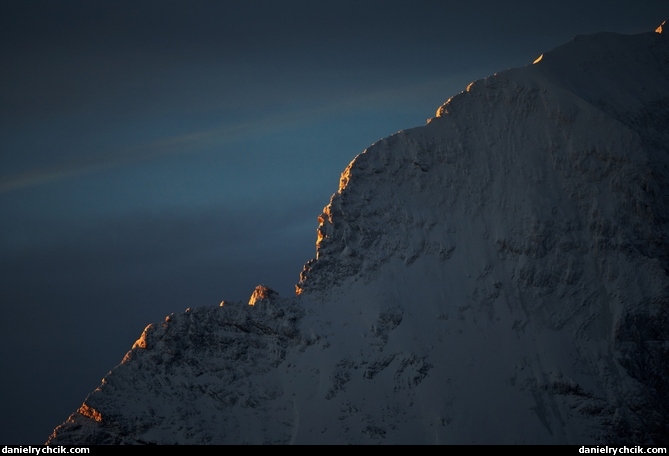 First rays of Sun over the Swiss Alps