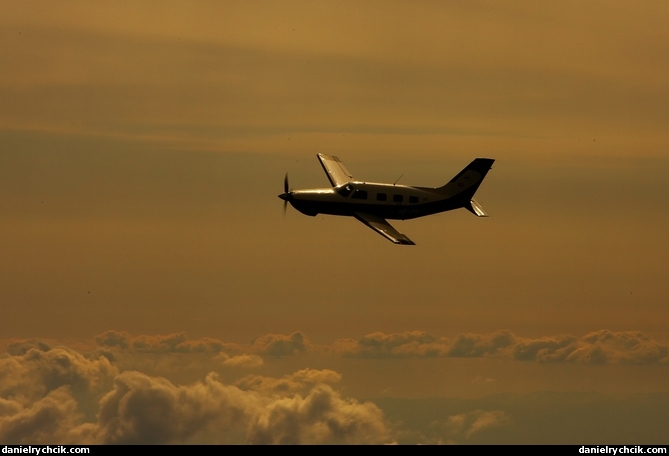 Piper Malibu HB-PRJ over the Swiss Alps