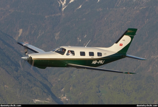 Piper Malibu HB-PRJ over Vaud