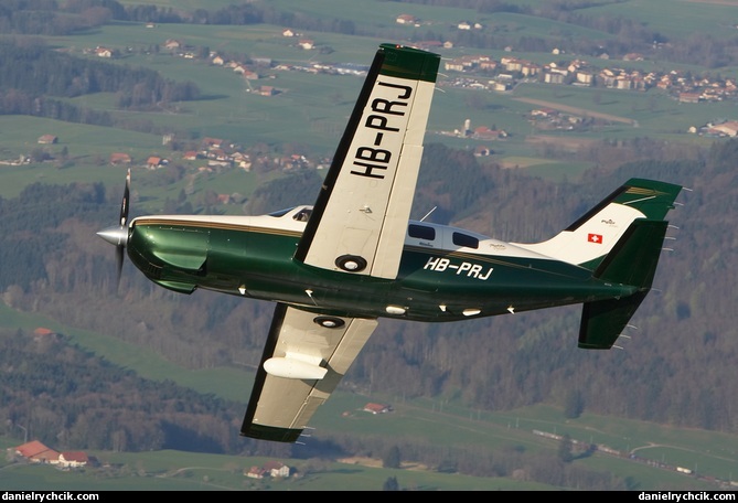 Piper Malibu HB-PRJ over Vaud