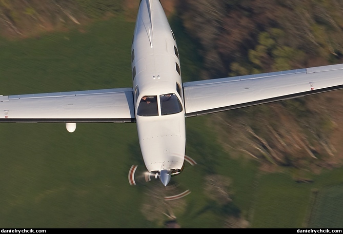 Piper Malibu HB-PRJ over Vaud