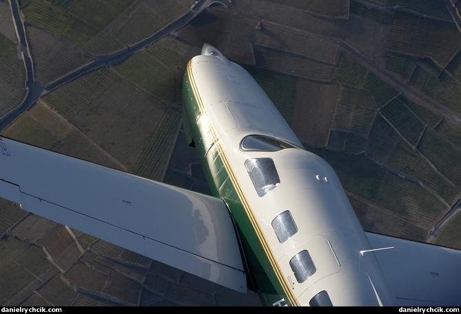 Piper Malibu HB-PRJ over Vaud