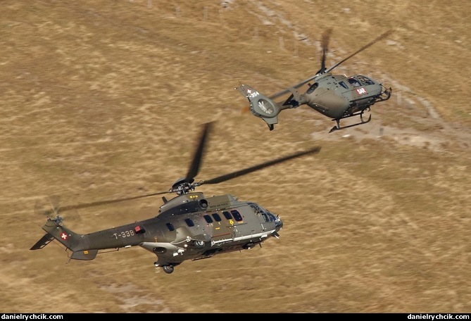 Super Puma and EC635 performing together at Axalp