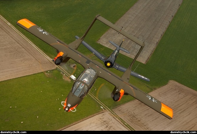 OV-10B Bronco and AT-6 Texan formation low-pass over Zoersel airfield